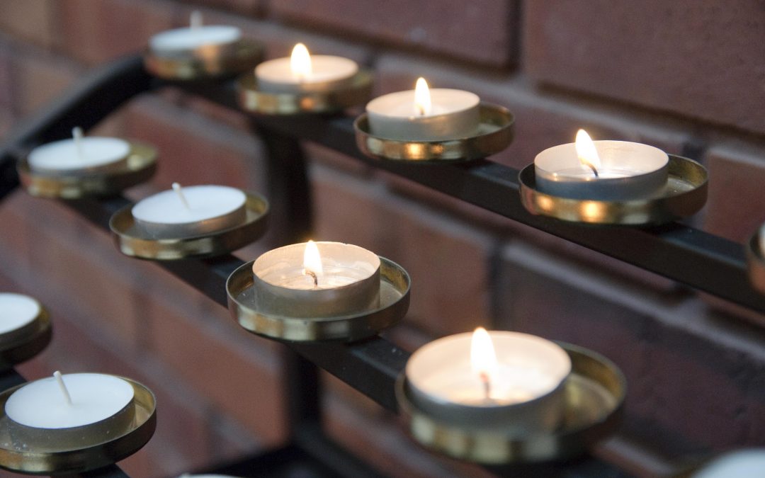 Prayer candles on stand